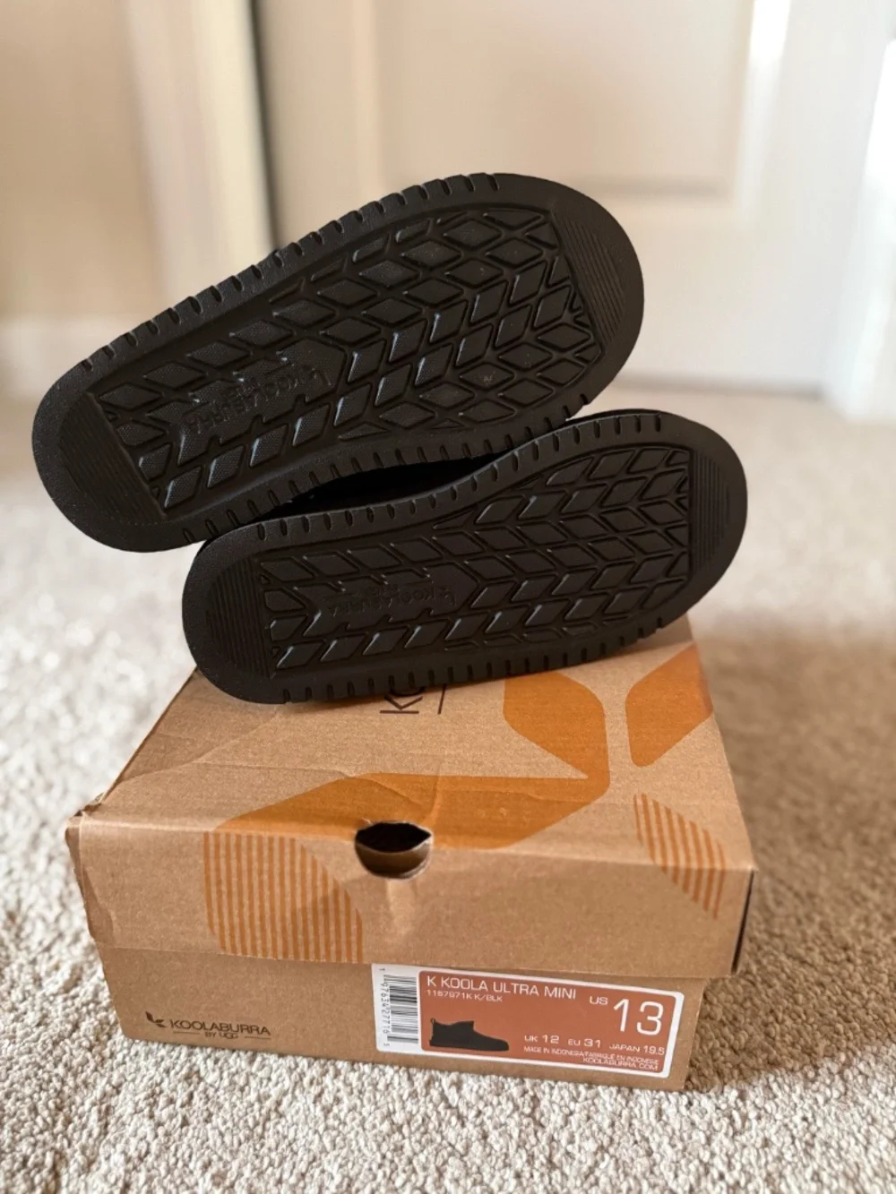 Mini Kookaburra by UGG Ultra mini black suede boot, size 13. Never worn